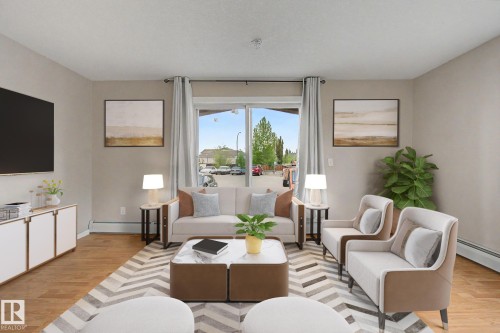 #105 240 Spruce Ridge Rd, Spruce Grove, AB - Indoor Photo Showing Living Room