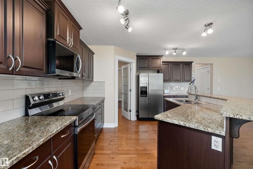 17330 8A Avenue Sw, Edmonton, AB - Indoor Photo Showing Kitchen With Double Sink With Upgraded Kitchen