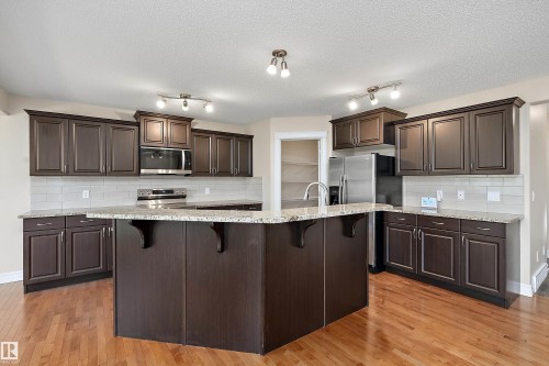 17330 8A Avenue Sw, Edmonton, AB - Indoor Photo Showing Kitchen With Upgraded Kitchen