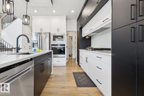 211 Kettyl Court, Leduc, AB - Indoor Photo Showing Kitchen With Upgraded Kitchen