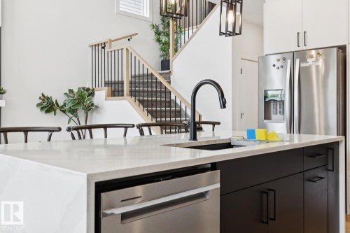 211 Kettyl Court, Leduc, AB - Indoor Photo Showing Kitchen With Upgraded Kitchen