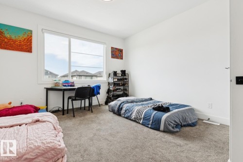 211 Kettyl Court, Leduc, AB - Indoor Photo Showing Bedroom