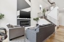 211 Kettyl Court, Leduc, AB  - Indoor Photo Showing Living Room With Fireplace 
