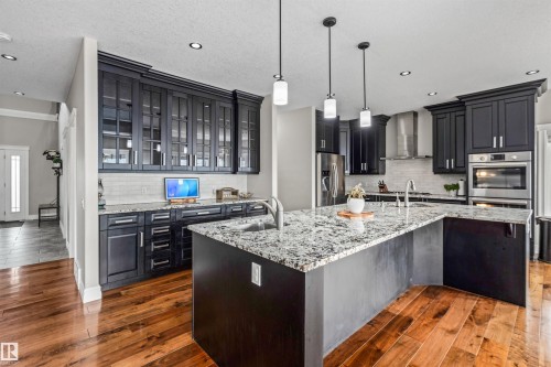 1421 Westerra Bay, Stony Plain, AB - Indoor Photo Showing Kitchen With Double Sink With Upgraded Kitchen