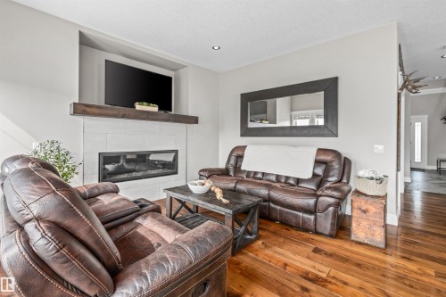 1421 Westerra Bay, Stony Plain, AB - Indoor Photo Showing Living Room With Fireplace