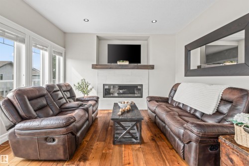 1421 Westerra Bay, Stony Plain, AB - Indoor Photo Showing Living Room With Fireplace