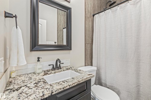 Main floor bathroom with walk in shower - 1421 Westerra Bay, Stony Plain, AB - Indoor Photo Showing Bathroom