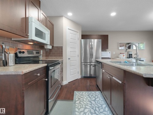 1692 Cunningham Way, Edmonton, AB - Indoor Photo Showing Kitchen With Double Sink With Upgraded Kitchen