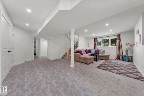 Lower level featuring light gray patterned carpeting, recessed lighting, and a white interior color palette - 4119 18 Avenue Nw, Edmonton, AB - Indoor