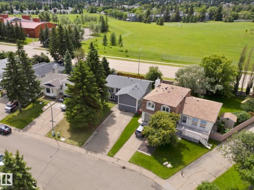 Property featuring a mature tree-lined street and landscaped grounds - 4119 18 Avenue Nw, Edmonton, AB - Outdoor With View