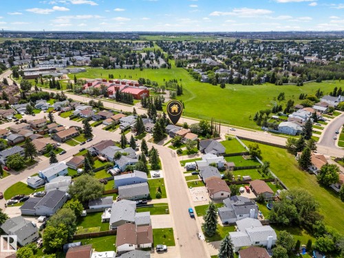 Residential neighborhood featuring detached homes and ample green spaces - 4119 18 Avenue Nw, Edmonton, AB - Outdoor With View