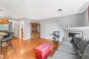 #19 15215 126 St Nw, Edmonton, AB  - Indoor Photo Showing Living Room With Fireplace 
