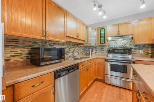 #19 15215 126 St Nw, Edmonton, AB - Indoor Photo Showing Kitchen With Stainless Steel Kitchen With Double Sink
