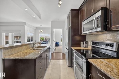 #465 11517 Ellerslie Rd Sw, Edmonton, AB - Indoor Photo Showing Kitchen With Double Sink With Upgraded Kitchen