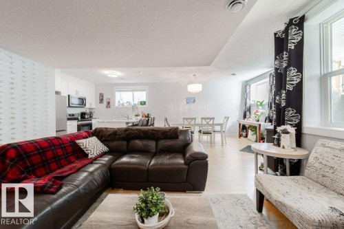 8731 85 Avenue Nw, Edmonton, AB - Indoor Photo Showing Living Room