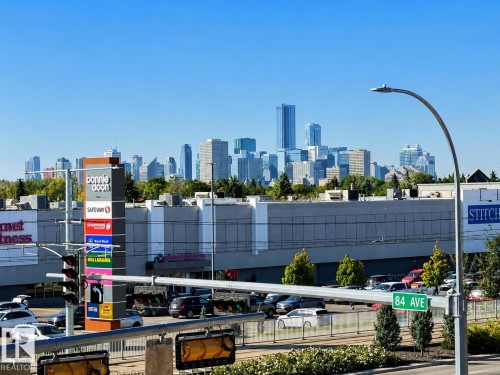 Urban skyline featuring numerous high-rise buildings - #302 8215 84 Av Nw, Edmonton, AB - Outdoor
