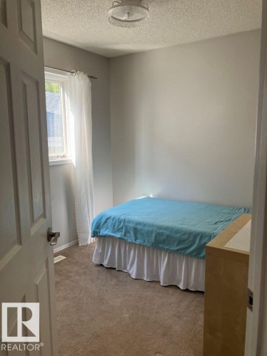 8029 17A Avenue Nw, Edmonton, AB - Indoor Photo Showing Bedroom