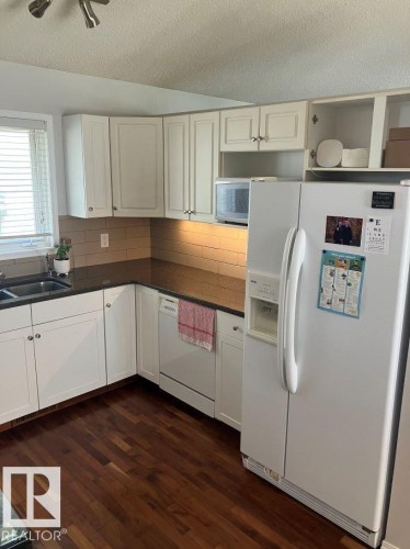 8029 17A Avenue Nw, Edmonton, AB - Indoor Photo Showing Kitchen With Double Sink