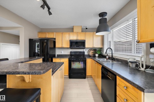 7214 19A Avenue Sw, Edmonton, AB - Indoor Photo Showing Kitchen With Double Sink