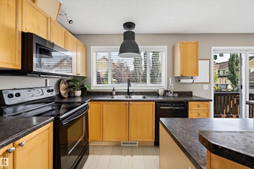 7214 19A Avenue Sw, Edmonton, AB - Indoor Photo Showing Kitchen With Double Sink