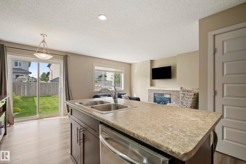 1715 Cunningham Way Sw, Edmonton, AB - Indoor Photo Showing Kitchen With Double Sink