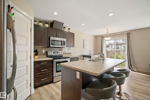 1715 Cunningham Way Sw, Edmonton, AB - Indoor Photo Showing Kitchen With Stainless Steel Kitchen With Double Sink