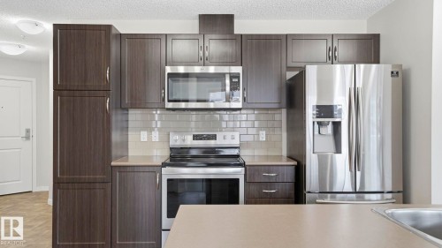 #229 1820 Rutherford Rd Sw, Edmonton, AB - Indoor Photo Showing Kitchen