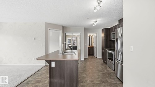#229 1820 Rutherford Rd Sw, Edmonton, AB - Indoor Photo Showing Kitchen