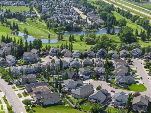Residential neighborhood featuring diverse architectural styles, mature trees, and manicured lawns - 38 Longview Point(E), Spruce Grove, AB - Outdoor With View