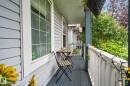 Covered porch featuring gray siding, white window trim, and a dark-colored floor - 833 Mcallister Crescent Sw, Edmonton, AB  - Outdoor With Deck Patio Veranda With Exterior 