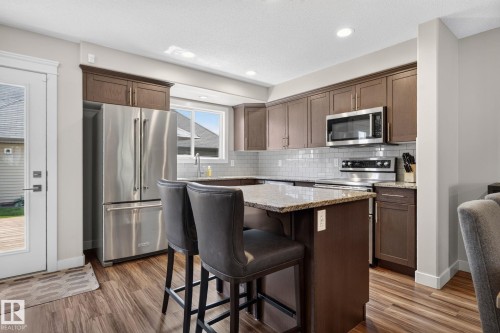 Kitchen - 319 Desrochers Boulevard Sw, Edmonton, AB - Indoor Photo Showing Kitchen With Stainless Steel Kitchen With Upgraded Kitchen