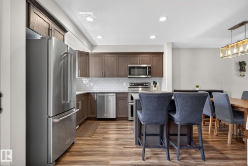 Kitchen - 319 Desrochers Boulevard Sw, Edmonton, AB - Indoor Photo Showing Kitchen With Stainless Steel Kitchen