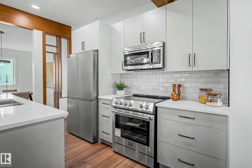 102 Goodridge Drive, St. Albert, AB - Indoor Photo Showing Kitchen With Stainless Steel Kitchen With Double Sink With Upgraded Kitchen