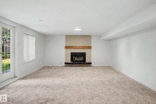 102 Goodridge Drive, St. Albert, AB - Indoor Photo Showing Other Room With Fireplace