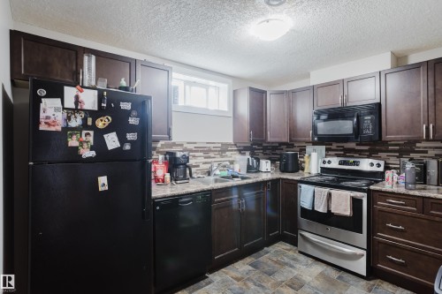 11916 152A Avenue, Edmonton, AB - Indoor Photo Showing Kitchen With Double Sink