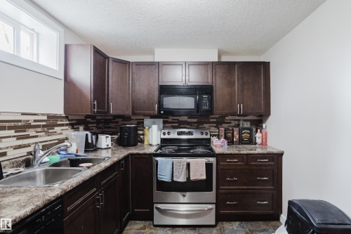 11916 152A Avenue, Edmonton, AB - Indoor Photo Showing Kitchen With Double Sink