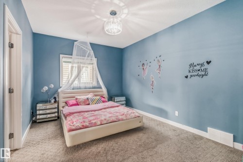 Spacious room featuring broadloom carpeting, a window with blinds, and white trim - 4104 8 Street Nw, Edmonton, AB - Indoor Photo Showing Bedroom