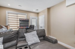 Recreational space featuring recessed lighting, light neutral wall paint, and white baseboards - 