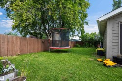 Expansive green lawn provides ample outdoor space - 