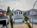 Two-story residence featuring white siding and gray trim - 16765 119 Street Nw, Edmonton, AB  - Outdoor 