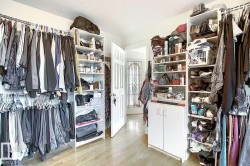 This property offers ample storage with built-in shelving and hanging rails - 