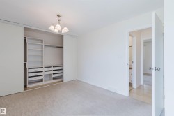 Built-in closet organization system with shelving and drawers - 