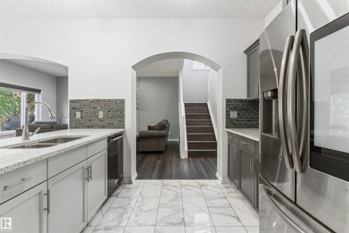 1075 Mckinney Green Nw, Edmonton, AB - Indoor Photo Showing Kitchen With Double Sink