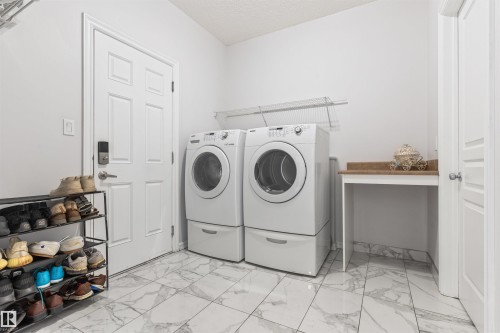 1075 Mckinney Green Nw, Edmonton, AB - Indoor Photo Showing Laundry Room