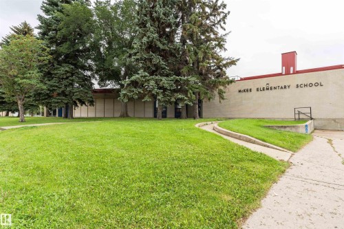 Expansive green space with mature trees - 4812 105B Street Nw, Edmonton, AB - Outdoor