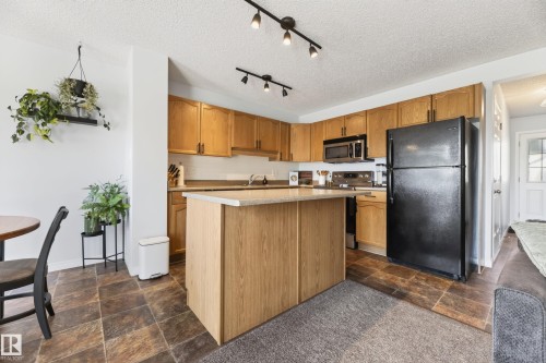 #6 12104 16 Av Sw, Edmonton, AB - Indoor Photo Showing Kitchen