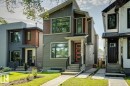 Modern architectural exterior featuring mixed material siding, a vibrant red entry door, and dark-trimmed windows - 10531 67 Avenue Nw, Edmonton, AB  - Outdoor With Facade 
