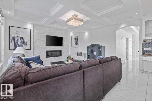 1242 Starling Drive Nw, Edmonton, AB - Indoor Photo Showing Living Room With Fireplace