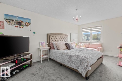 1242 Starling Drive Nw, Edmonton, AB - Indoor Photo Showing Bedroom