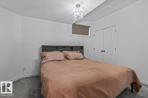 1242 Starling Drive Nw, Edmonton, AB - Indoor Photo Showing Bedroom